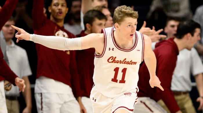Charleston guard Ryan Larson celebrates a score